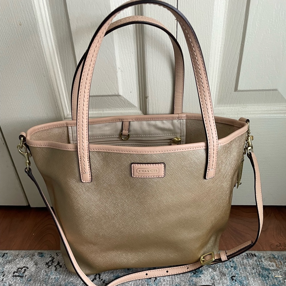 Coach. Great summer bag!  Leather straps. Light gold. NWOT
